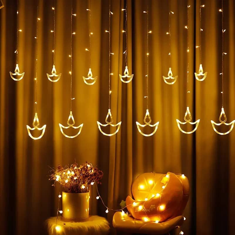 Diwali Diya Curtain Lights @ ₹ 349 String Lights with 12 Hanging Diya 138 LED String led Light 3 Meter, 8 Flashing Modes, Decoration Lighting, Festive Home Decor